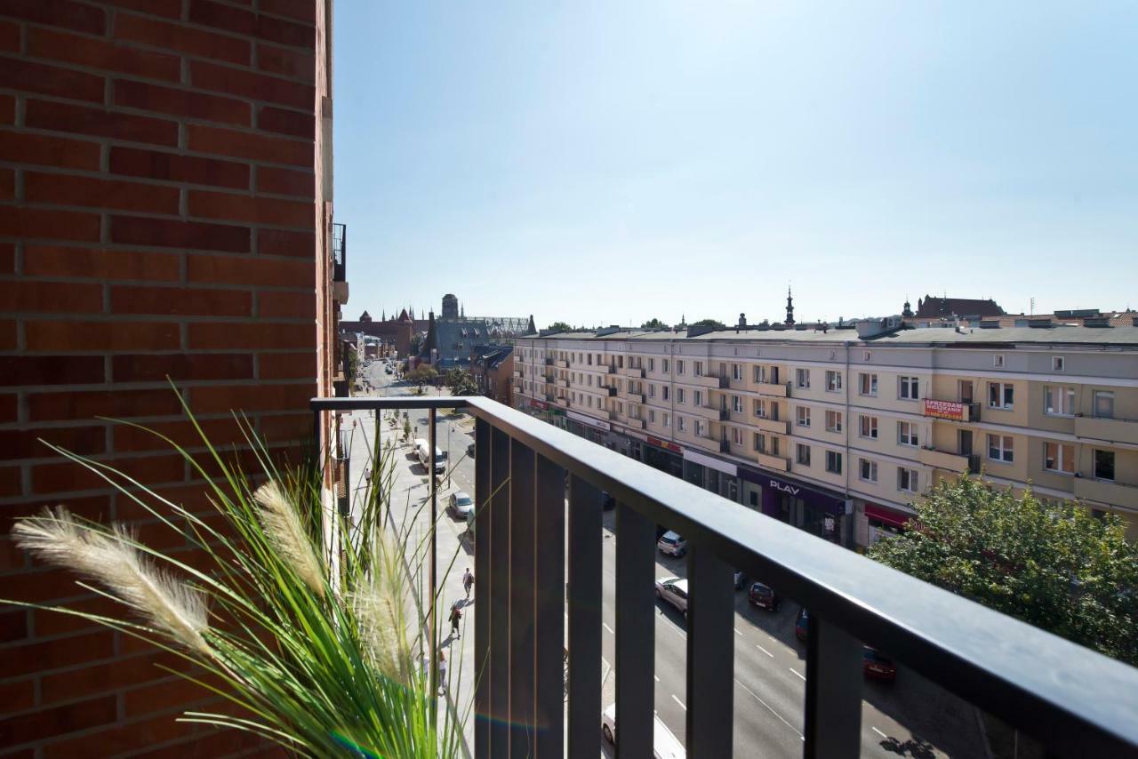 Chic Designer With Original Art And Old Town View